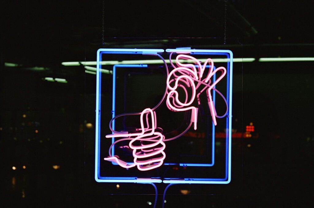 blue and red neon light signage